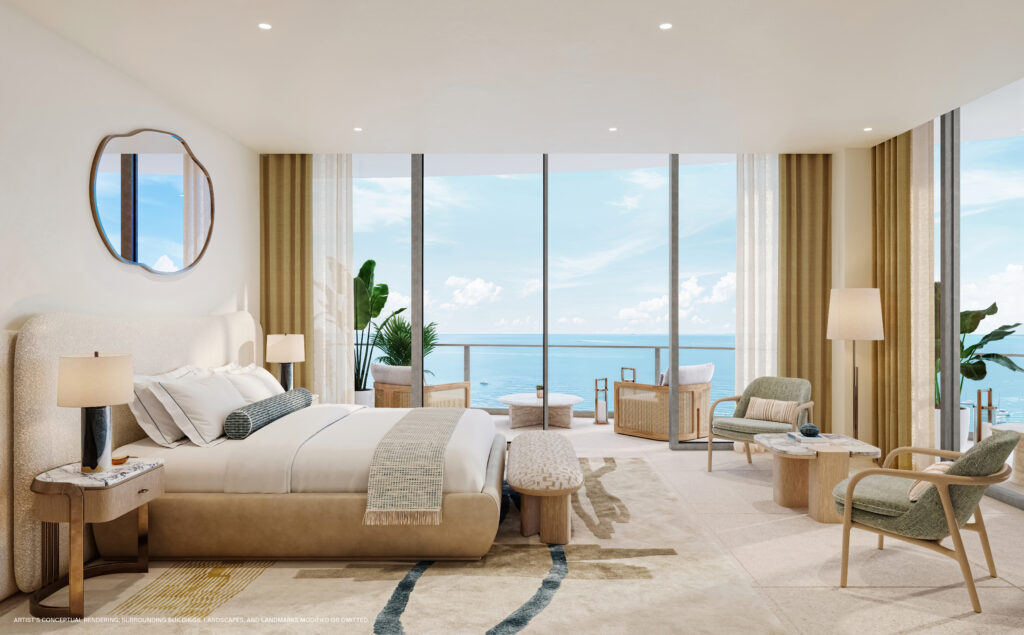 St Regis Bahia Mar primary bedroom with floor-to-ceiling windows and ocean view