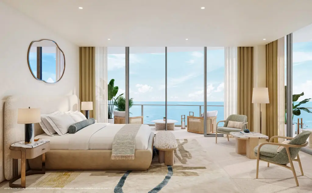 St Regis Bahia Mar primary bedroom with floor-to-ceiling windows and ocean view